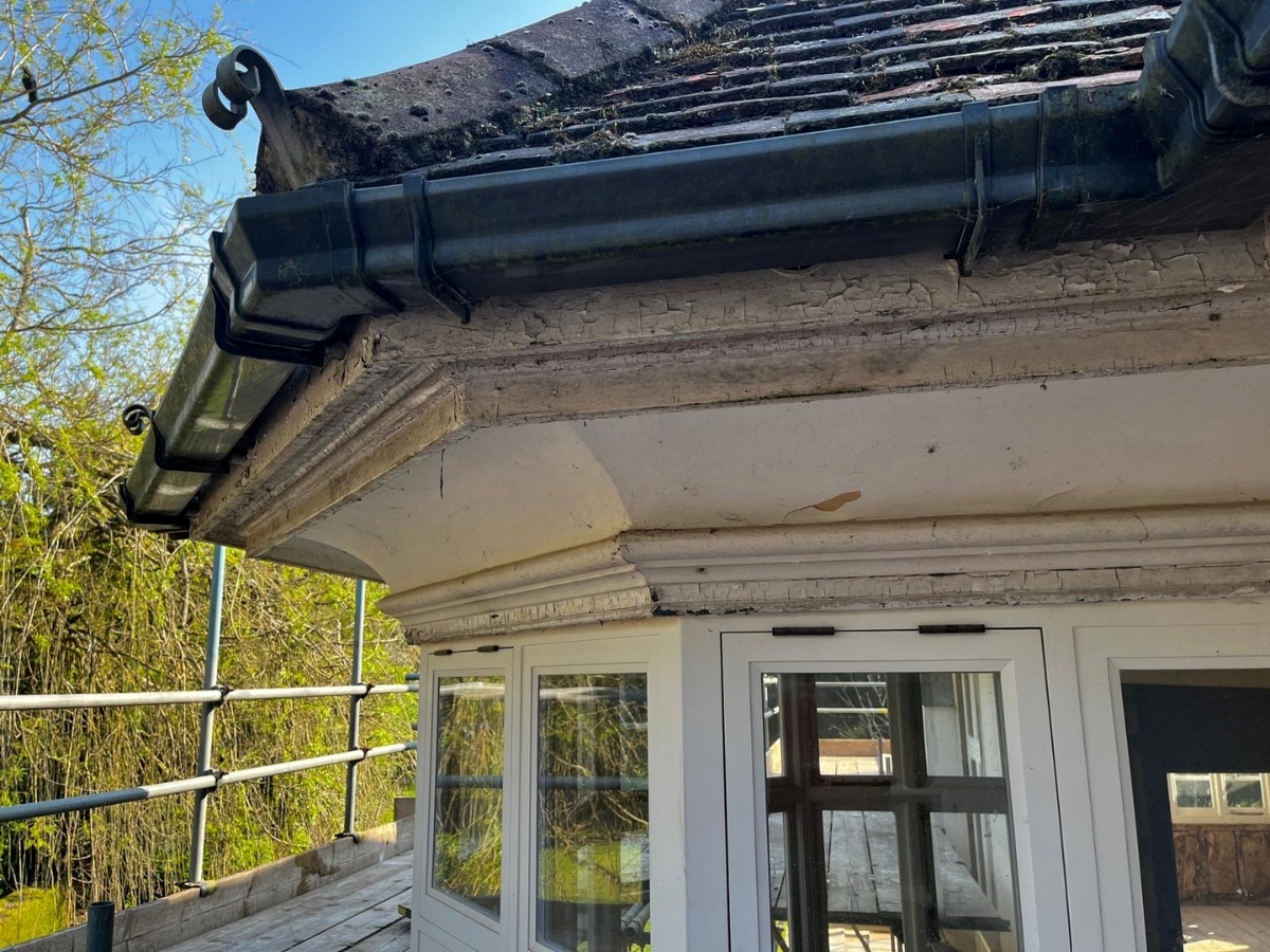 Historic cornice detail under eaves preserved during retrofit